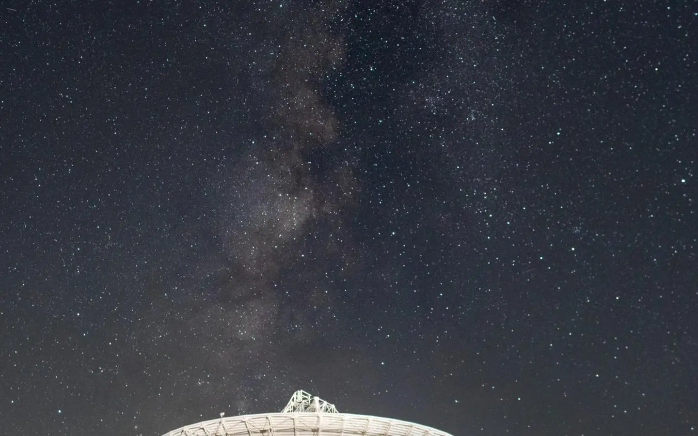Goldstone radio antenna beneath the Milky Way