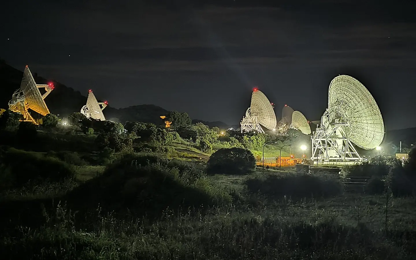Deep Space Network radio antennas pointed toward the sky